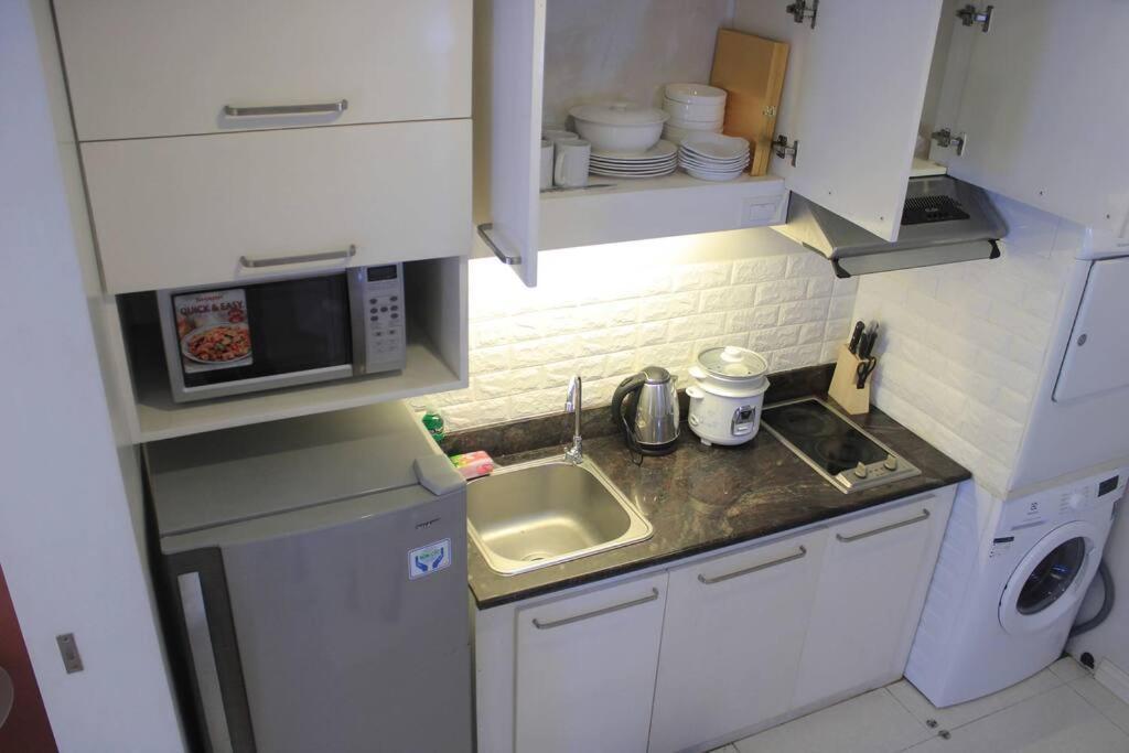 A2j Bgc Luxury 1br Near Burgos Circle & Mall
